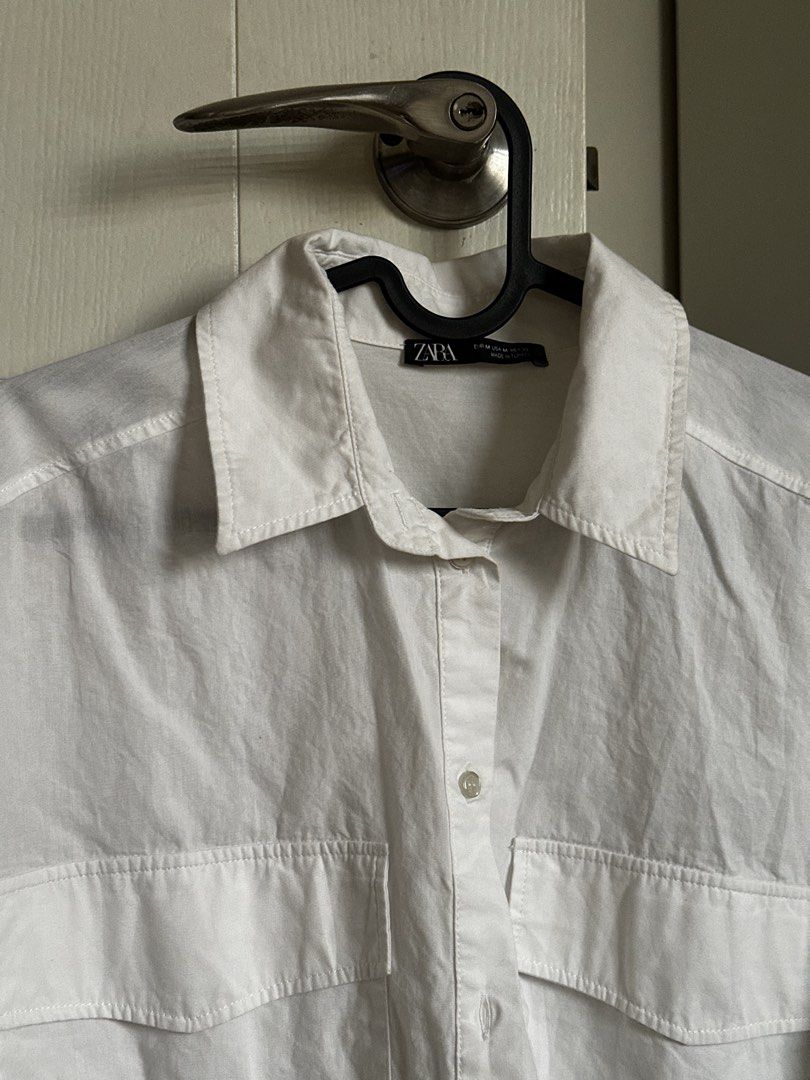 Zara White Polo Blouse ‼️ (Category: Blouses) located in Pasig City. Submitted by theclosetclaud (Listing ID 1469639081, Image 2). Description: .