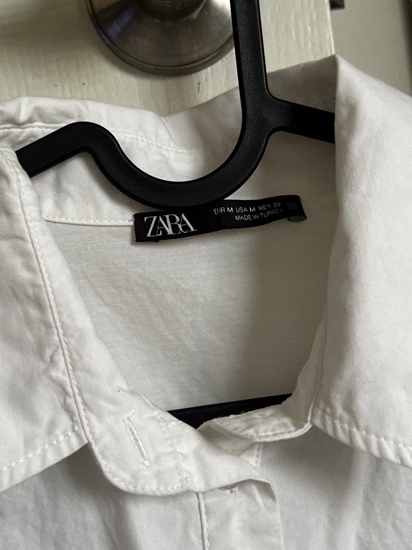 Zara White Polo Blouse ‼️ (Category: Blouses) located in Pasig City. Submitted by theclosetclaud (Listing ID 1469639081, Image 3). Description: .
