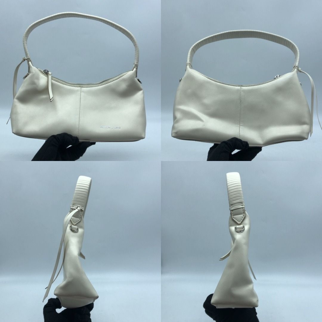 267010453 CHARLES & KEITH BAG SIMONE SHOULDER BAG (Category: Luxury Bags & Wallets) located in Taguig. Submitted by ecoring.ph (Listing ID 1469803876, Image 2). Description: ◆CONDITION: B ◆DESCRIPTIONS: (Other defects/info:) OUTER: The body of the bag is scratched, scuffed, stained, dirty, wrinkled, and deformed, has press marks, and shows signs of use. The body of the bag is scratched, scuffed, stained, dirty, wrinkled, and deformed, has press m