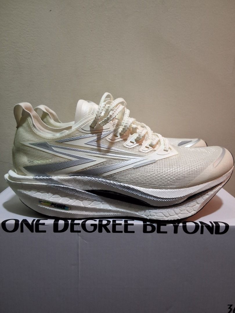 361 Degrees Flame 3 Running Shoes White Silver (Category: Sneakers) located in Caloocan City. Submitted by kara_jerry23 (Listing ID 1469885784, Image 3). Description: 361 Degrees Flame 3 running shoes. White and silver colorway with striking midsole geometry and textured lacing. Includes the original branded box with tissue paper. Clean outsoles showing zero wear. Premium lightweight mesh upper..