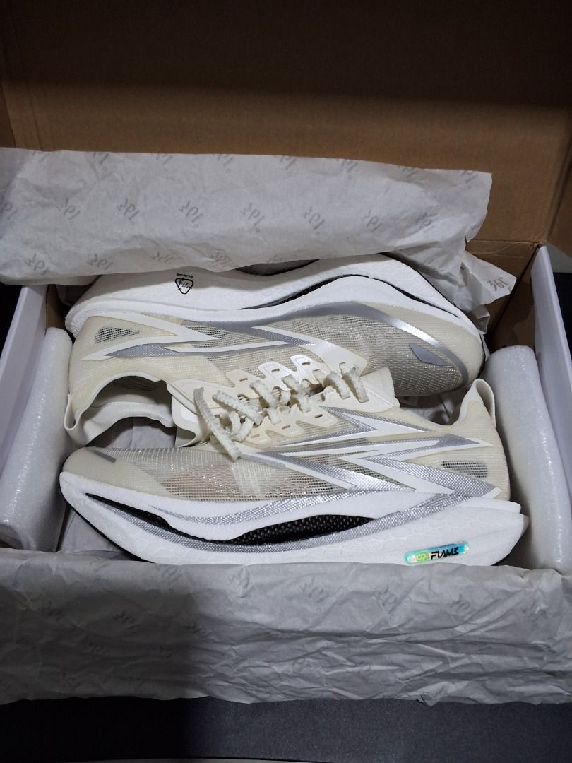 361 Degrees Flame 3 Running Shoes White Silver (Category: Sneakers) located in Caloocan City. Submitted by kara_jerry23 (Listing ID 1469885784, Image 1). Description: 361 Degrees Flame 3 running shoes. White and silver colorway with striking midsole geometry and textured lacing. Includes the original branded box with tissue paper. Clean outsoles showing zero wear. Premium lightweight mesh upper..