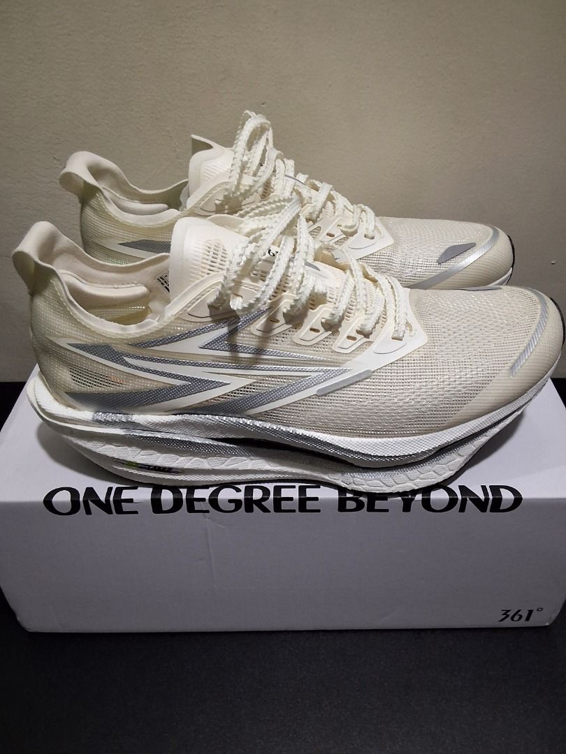 361 Degrees Flame 3 Running Shoes White Silver (Category: Sneakers) located in Caloocan City. Submitted by kara_jerry23 (Listing ID 1469885784, Image 2). Description: 361 Degrees Flame 3 running shoes. White and silver colorway with striking midsole geometry and textured lacing. Includes the original branded box with tissue paper. Clean outsoles showing zero wear. Premium lightweight mesh upper..