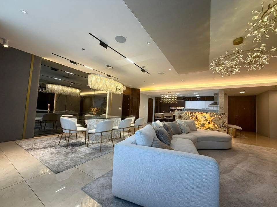 3BR +SMALL ROOM THE SUITES FOR RENT (Category: Apartments & Condos) located in Taguig. Submitted by synergeticrealtyinc (Listing ID 1469794810, Image 2). Description: 3BR + 1 SMALL ROOM THE SUITES FOR RENT Exquisitely Renovated 3BR Grand Suite + 1 Small Room Ideal for family, never been rented 249 SQM, Semi Furnished 23rd floor no balcony Amenity View - Features a dramatic, backlit quartz or agate kitchen island that serves as a stunning function
