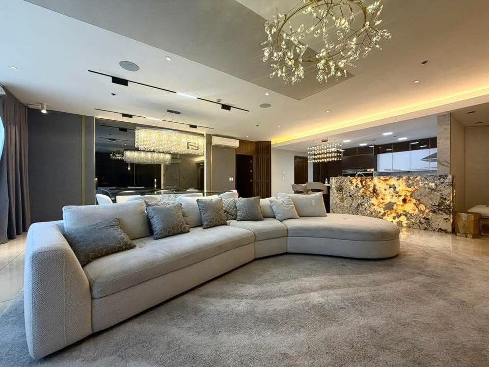 3BR +SMALL ROOM THE SUITES FOR RENT (Category: Apartments & Condos) located in Taguig. Submitted by synergeticrealtyinc (Listing ID 1469794810, Image 1). Description: 3BR + 1 SMALL ROOM THE SUITES FOR RENT Exquisitely Renovated 3BR Grand Suite + 1 Small Room Ideal for family, never been rented 249 SQM, Semi Furnished 23rd floor no balcony Amenity View - Features a dramatic, backlit quartz or agate kitchen island that serves as a stunning function