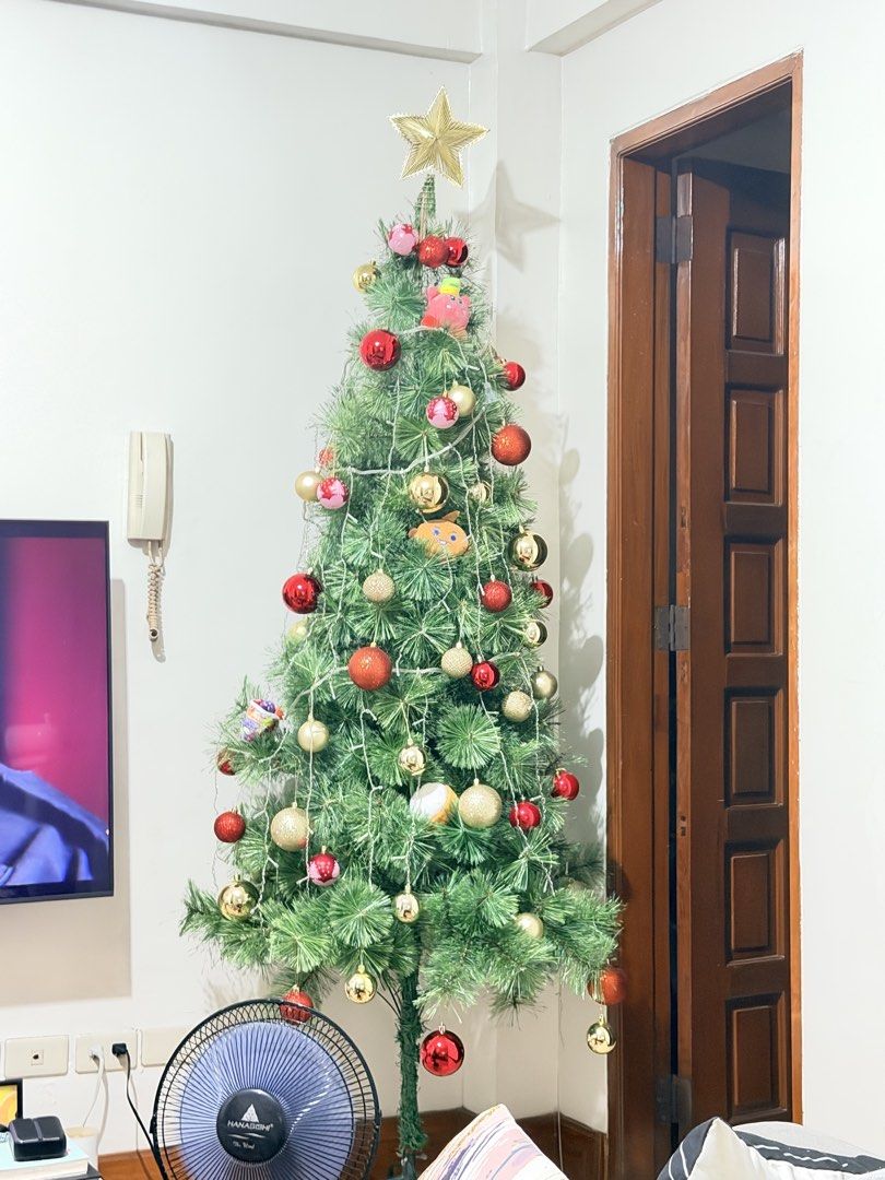 7ft Christmas Tree (Category: Artificial Plants & Flowers) located in Pasig City. Submitted by cadiprudente (Listing ID 1469825870, Image 2). Description: 7ft Christmas Tree with ornaments All decor and curtain lights included LOC: Quezon City.