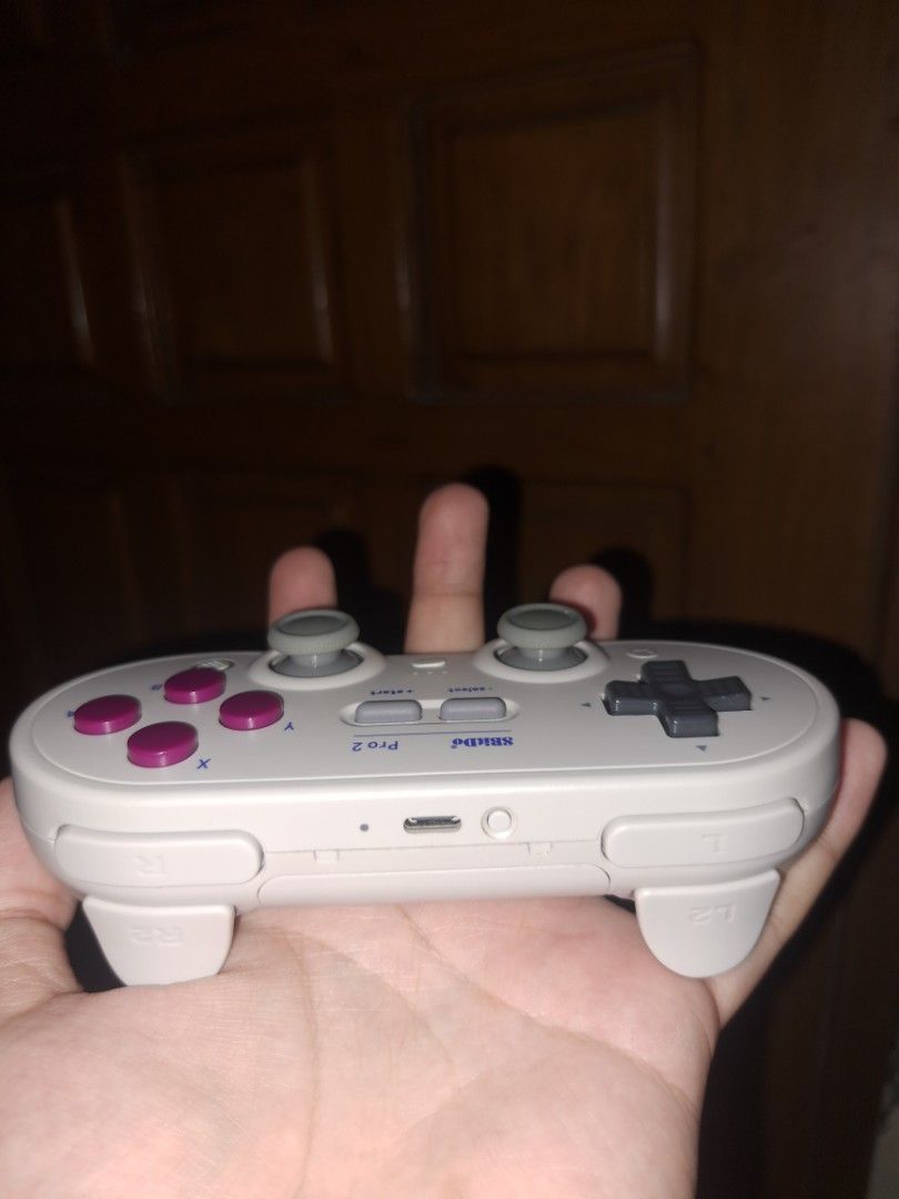 8bitDo Pro 2 Bluetooth Controller (Category: Controllers) located in Manila. Submitted by cosmiclion_545370 (Listing ID 1469897099, Image 2). Description: ✅ Used only ONCE to test if working ✅ Like-new condition — no scratches or wear and tear ✅ 100% working, no issues ✅ Complete with original box, accessories, and receipt ✅ Bluetooth & wired connectivity ✅ Hall Effect joysticks 🛒 **Original Price: ₱1,895** **Reason for selling:** Gifted to me, 