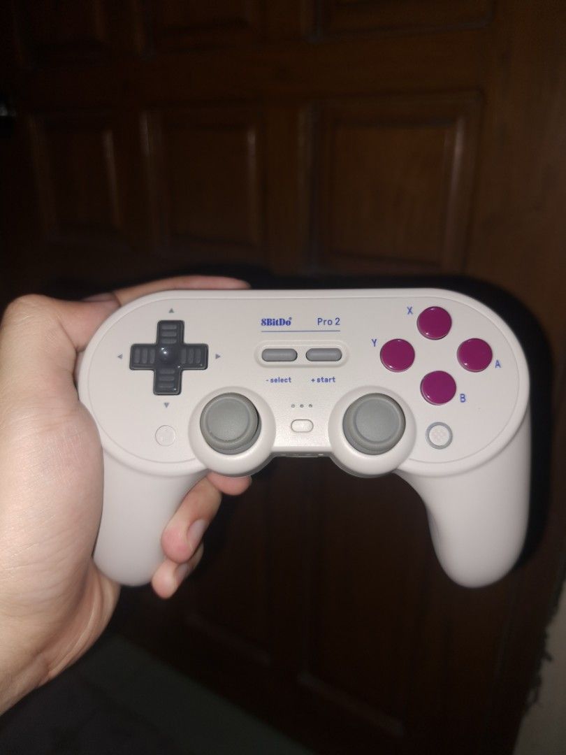 8bitDo Pro 2 Bluetooth Controller (Category: Controllers) located in Manila. Submitted by cosmiclion_545370 (Listing ID 1469897099, Image 3). Description: ✅ Used only ONCE to test if working ✅ Like-new condition — no scratches or wear and tear ✅ 100% working, no issues ✅ Complete with original box, accessories, and receipt ✅ Bluetooth & wired connectivity ✅ Hall Effect joysticks 🛒 **Original Price: ₱1,895** **Reason for selling:** Gifted to me, 