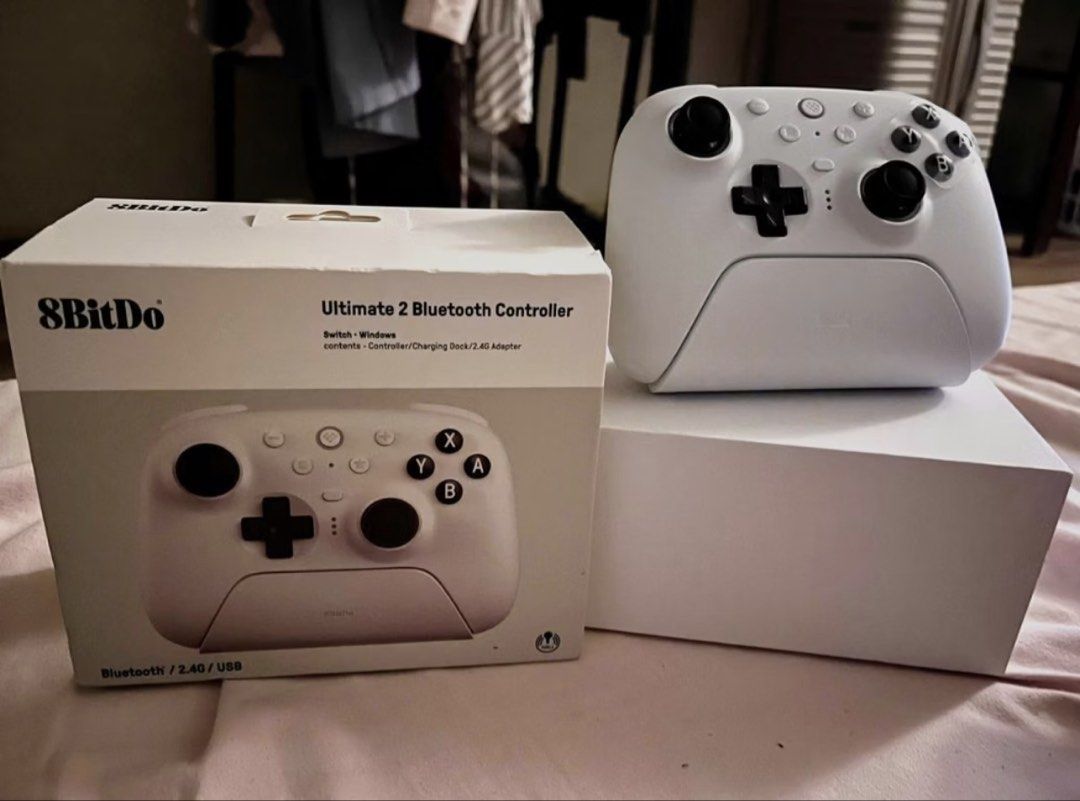 8BitDo Ultimate 2 Bluetooth Controller White (Category: Controllers) located in Manila. Submitted by mackmik (Listing ID 1469849035, Image 1). Description: - Model: 8BitDo Ultimate 2 Bluetooth Controller (White) - Compatibility: Nintendo Switch and Windows PC - Inclusions: Charging dock, 2.4G wireless adapter, and original box - Condition: Excellent / Like new - Meetup or shipping options available across laguna.