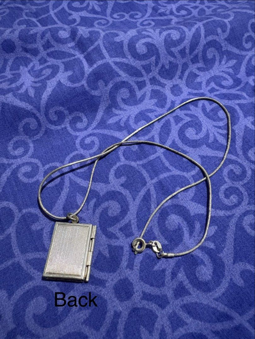 925 Sterling Silver Book Locket Necklace (Category: Necklaces) located in Quezon City. Submitted by meggys_treasures (Listing ID 1469918214, Image 2). Description: Note: This was given to me as a gift several years ago. Original packing is already missing. Hence, I cannot guarantee authenticity of the brand and of the silver content. - Size 16 - w/ TC brand markings, pls chat for more pics - with 925 markings - Never worn. Just kept as collection