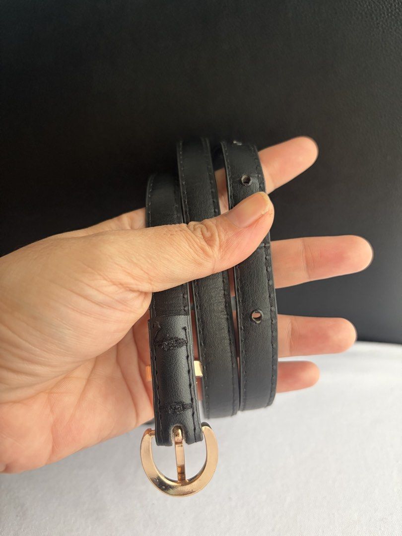 9. Black Slim Leather Belt 2 (Category: Belts) located in Quezon City. Submitted by wagwagan_ukay_blues (Listing ID 1469852463, Image 2). Description: From Japan In good condition Please expect signs of usage Hole Size-31”-37” Overall-40” Width-.5” Novaliches Qc.