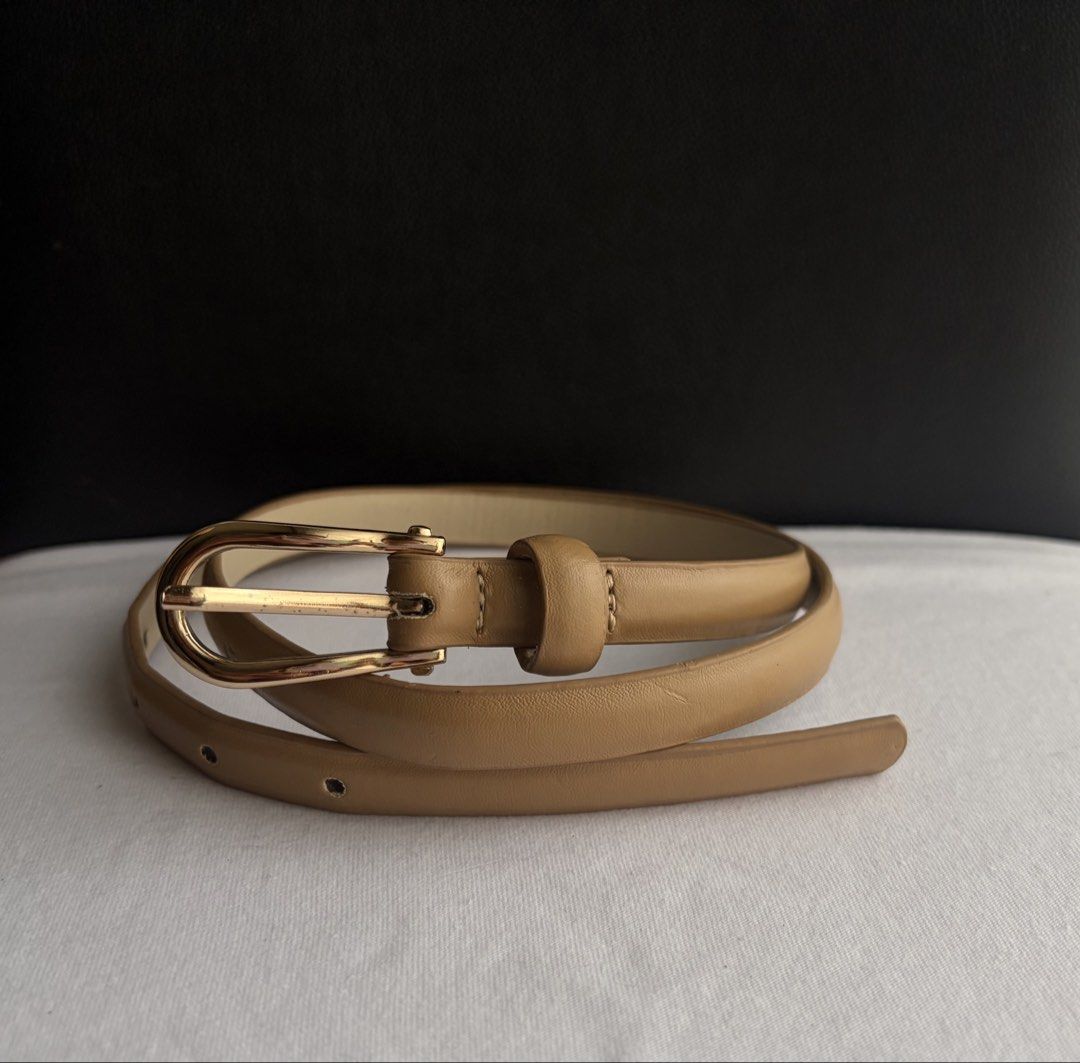 9. Slim Light Brown Leather Belt (Category: Belts) located in Quezon City. Submitted by wagwagan_ukay_blues (Listing ID 1469854506, Image 1). Description: From Japan In good condition Please expect signs of usage Hole Size-27”-33” Overall-37” Width-.5” Novaliches Qc.