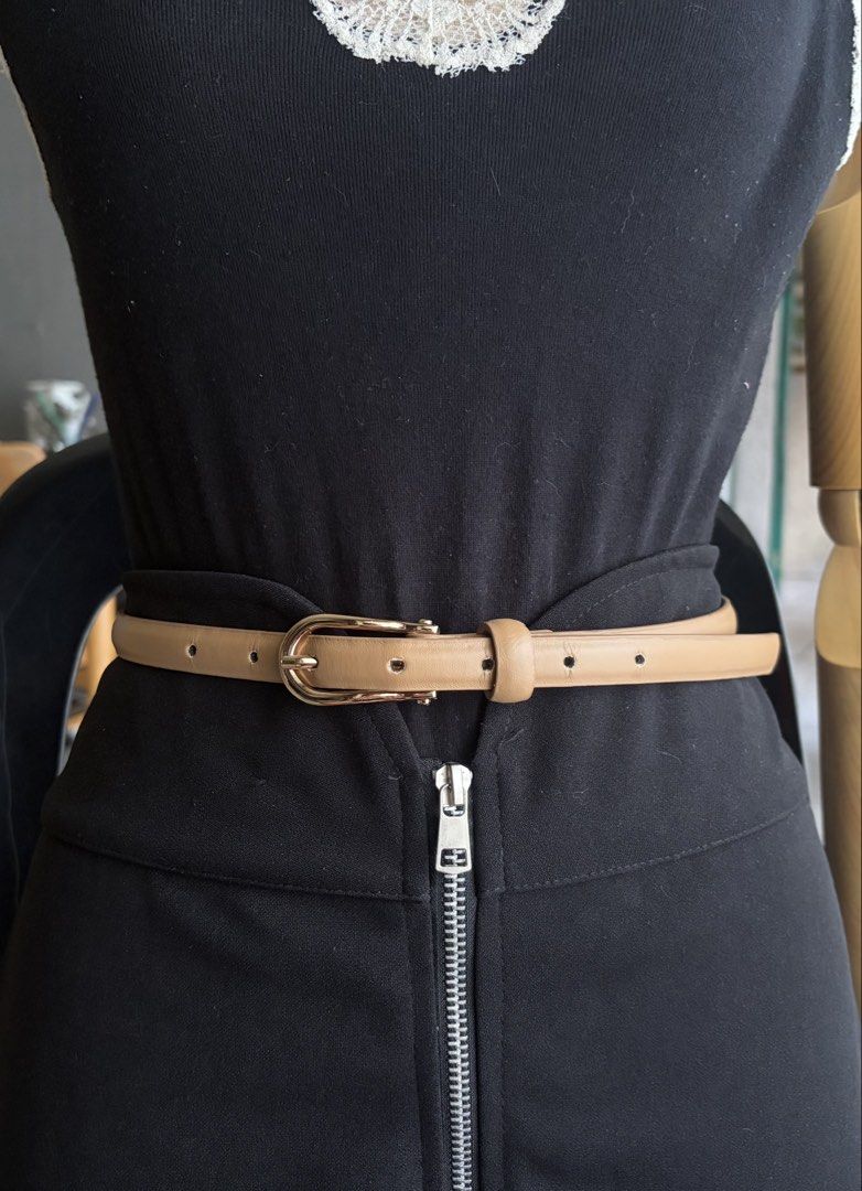 9. Slim Light Brown Leather Belt (Category: Belts) located in Quezon City. Submitted by wagwagan_ukay_blues (Listing ID 1469854506, Image 3). Description: From Japan In good condition Please expect signs of usage Hole Size-27”-33” Overall-37” Width-.5” Novaliches Qc.