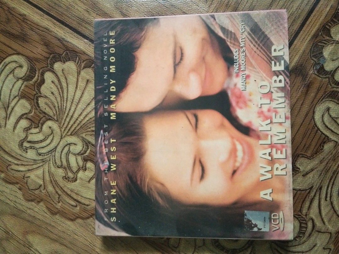 A Walk to Remember VCD Movie (Category: CDs & DVDs) located in Caloocan City. Submitted by lonewolf22 (Listing ID 1469797534, Image 1). Description: - Title: A Walk to Remember (2002) - Format: VCD (Case and disc included) - Starring: Mandy Moore & Shane West - Special Feature: Includes Mandy Moore's hit song "Cry" music video - Genre: Classic teen romance drama (Based on the bestselling Nicholas Sparks novel) - Condition: Great for collectors an
