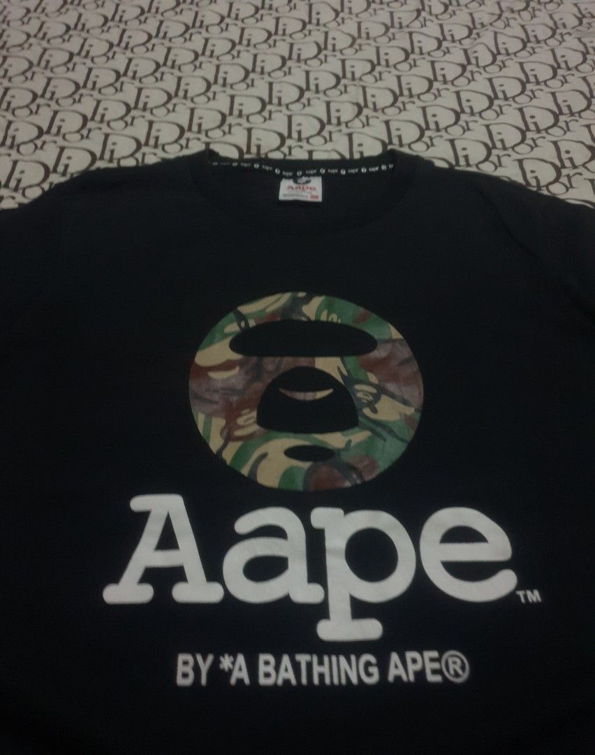 Aape camou head design (Category: Tshirts & Polo Shirts ) located in San Fernando. Submitted by retro.district. (Listing ID 1469897502, Image 2). Description: - Aape camou head design - Size: Medium (20.5x27) - Condition: Excellent - No issue - Color Rate: 9.5/10.