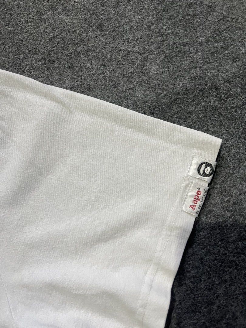Aape tshirt (Category: Earphones) located in Lapu Lapu. Submitted by jhonrener41426 (Listing ID 1469828897, Image 3). Description: Size large fit to medium Waist-20 Length-27 Excellent condition Color rate 9.8/10 Authentic Issue none .
