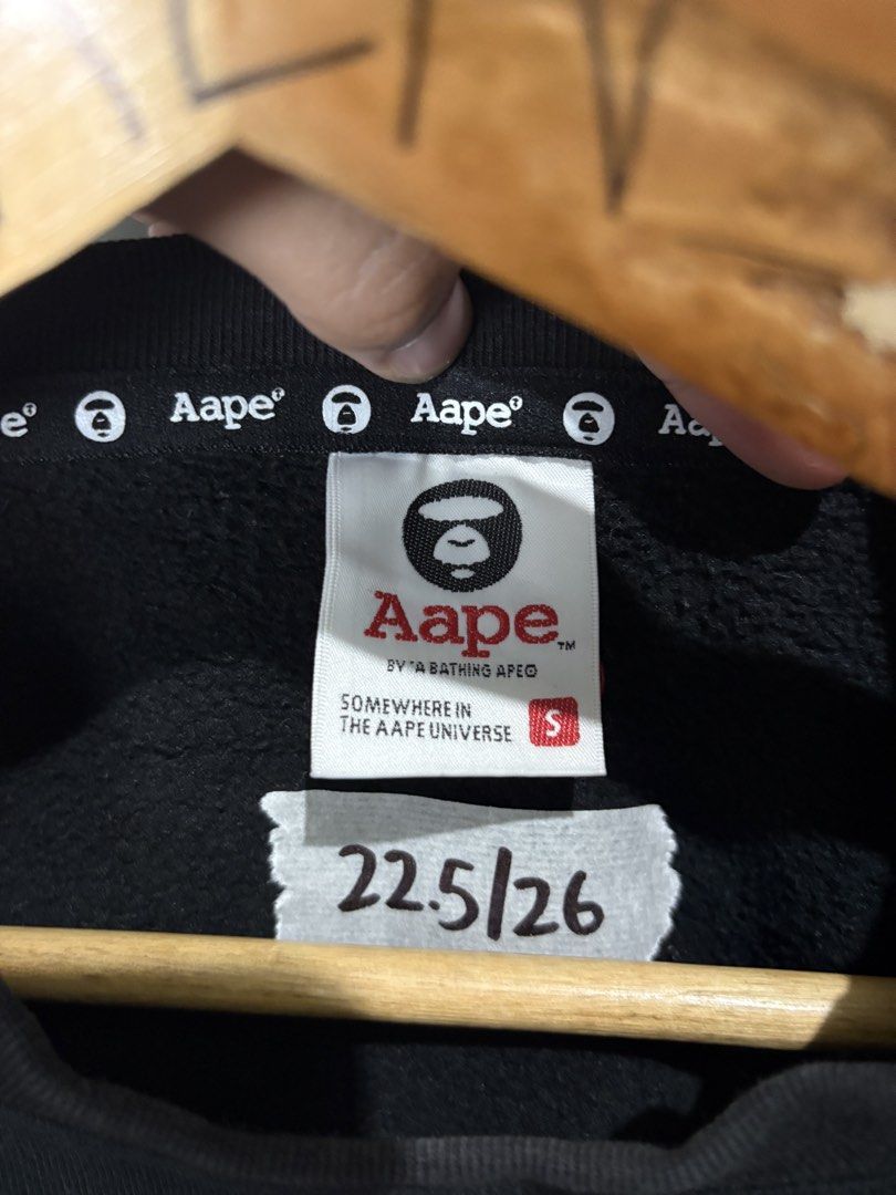 AAPE x One Piece Black Sweatshirt Size S (Category: Coats, Jackets and Outerwear) located in Manila. Submitted by thriftnikenv.2 (Listing ID 1469865280, Image 3). Description: - Brand: AAPE by A Bathing Ape x One Piece - Item: Black Crewneck Sweatshirt - Size: Small - Design: Luffy skull logo on chest, large graphic on back, branded sleeve and collar details - Material: Comfortable cotton and polyester blend - Condition: Brand new / Excellent - M
