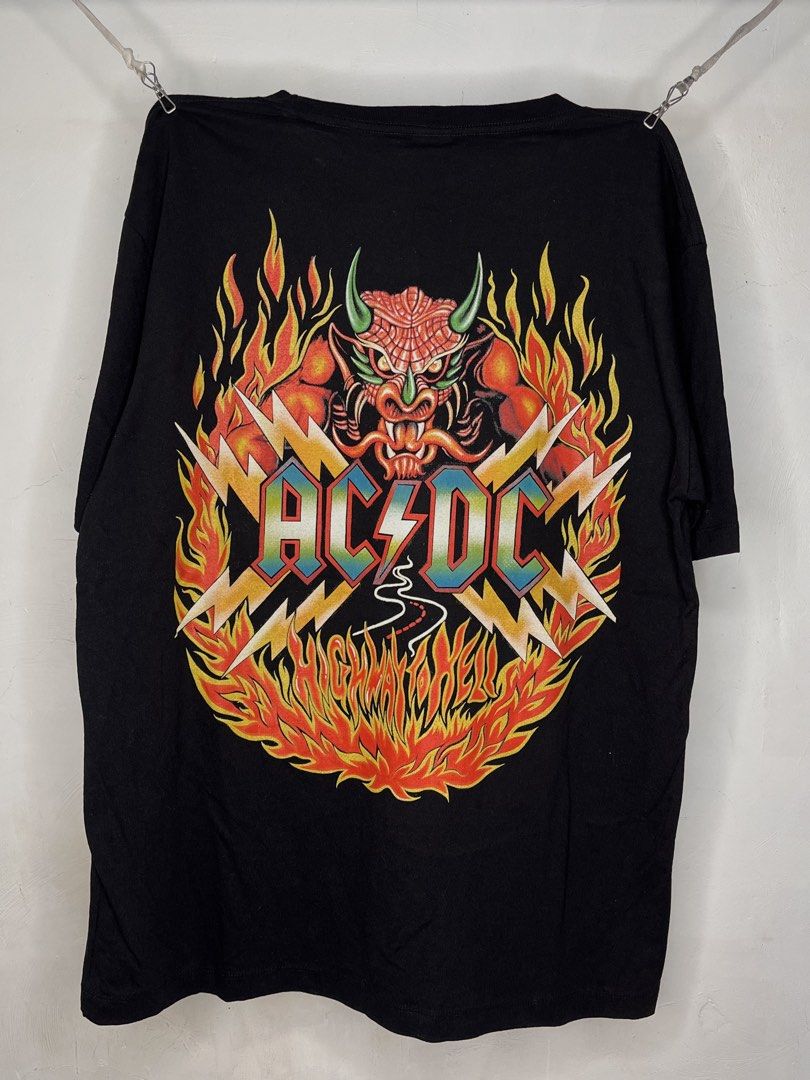 AC/DC Highway to Hell Rockvolution Black T-Shirt XL (Category: Tshirts & Polo Shirts ) located in Cavite. Submitted by ozzyozzx (Listing ID 1469880452, Image 1). Description: - Brand: Rockvolution - Design: Classic AC/DC Highway to Hell devil and fire graphic (vibrant, no cracking) - Color: Black - Size: XL (loose and comfortable fit) - Material: Heavy cotton.