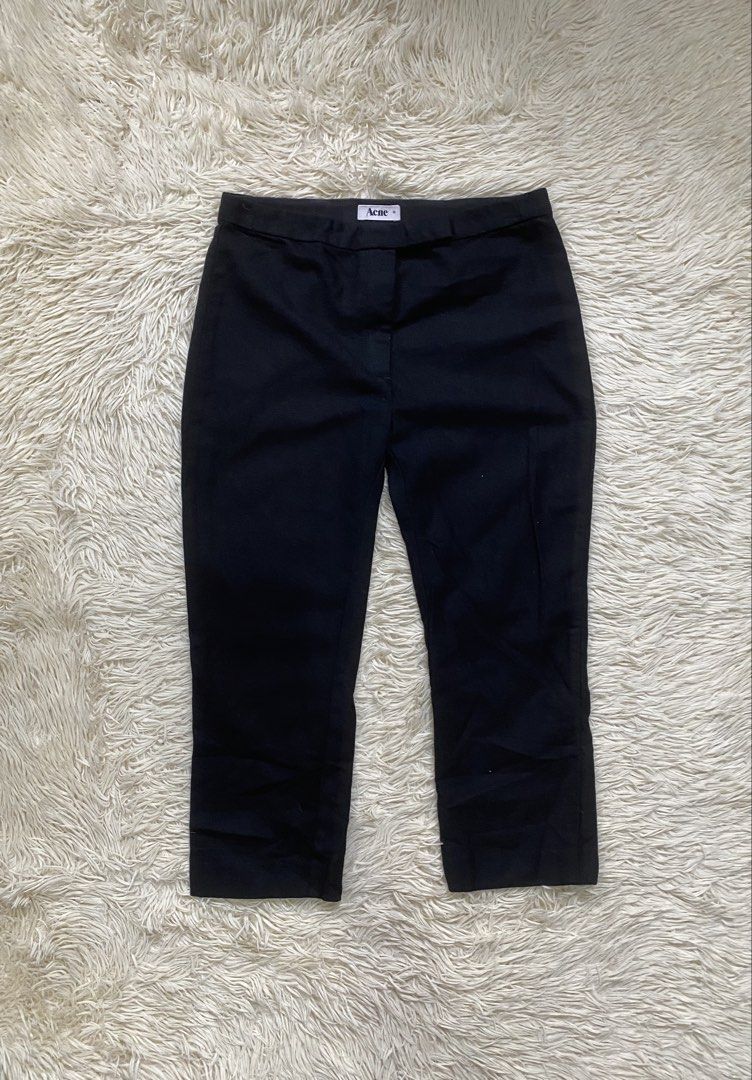 Acne Black Trousers Size 36 (Category: Other Bottoms) located in Antipolo. Submitted by switchneighborhood (Listing ID 1469819199, Image 1). Description: - Brand: Acne - Color: Solid black - Size: 36 - Design: Classic cropped length - Features: Clean waistband construction with rear pocket detail - Styling: Versatile piece for casual or smart outfits.