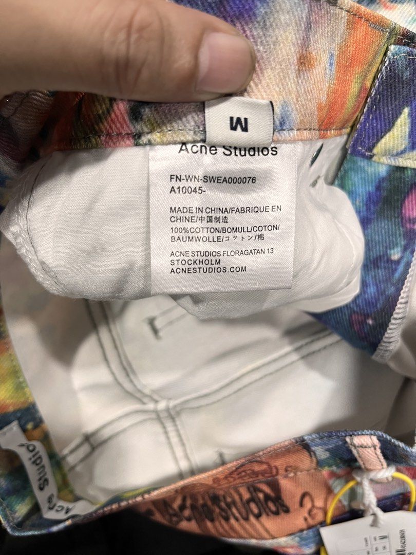 Acne studio (Category: Jeans) located in Manila. Submitted by style_hoods (Listing ID 1469792793, Image 3). Description: the Acne Studios 1981F paint-splatter wide-leg jeans, from their 2024 collection. They feature a vibrant, multicolor digital print that looks like real paint splatters and brushstrokes — a trompe-l’œil effect that tricks the eye into thinking it’s actual paint. It’s a relaxed, mid-rise, wide-leg fit made from cotton denim￼￼￼. T