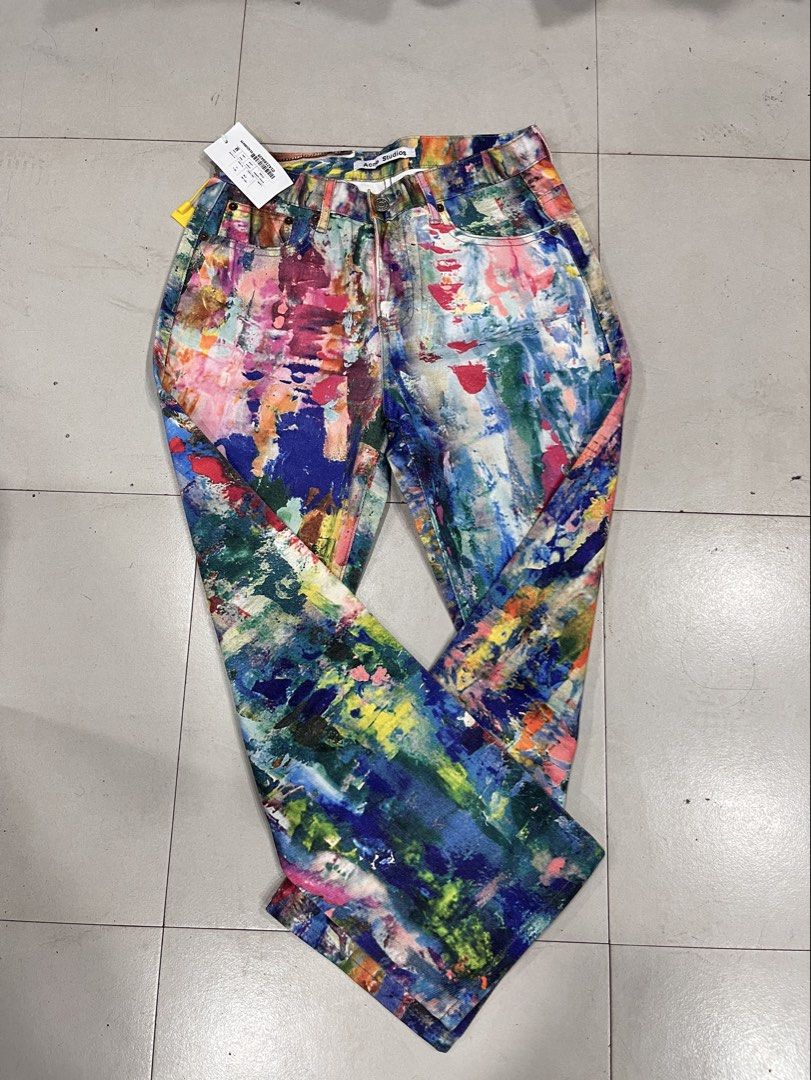 Acne studio (Category: Jeans) located in Manila. Submitted by style_hoods (Listing ID 1469792793, Image 1). Description: the Acne Studios 1981F paint-splatter wide-leg jeans, from their 2024 collection. They feature a vibrant, multicolor digital print that looks like real paint splatters and brushstrokes — a trompe-l’œil effect that tricks the eye into thinking it’s actual paint. It’s a relaxed, mid-rise, wide-leg fit made from cotton denim￼￼￼. T