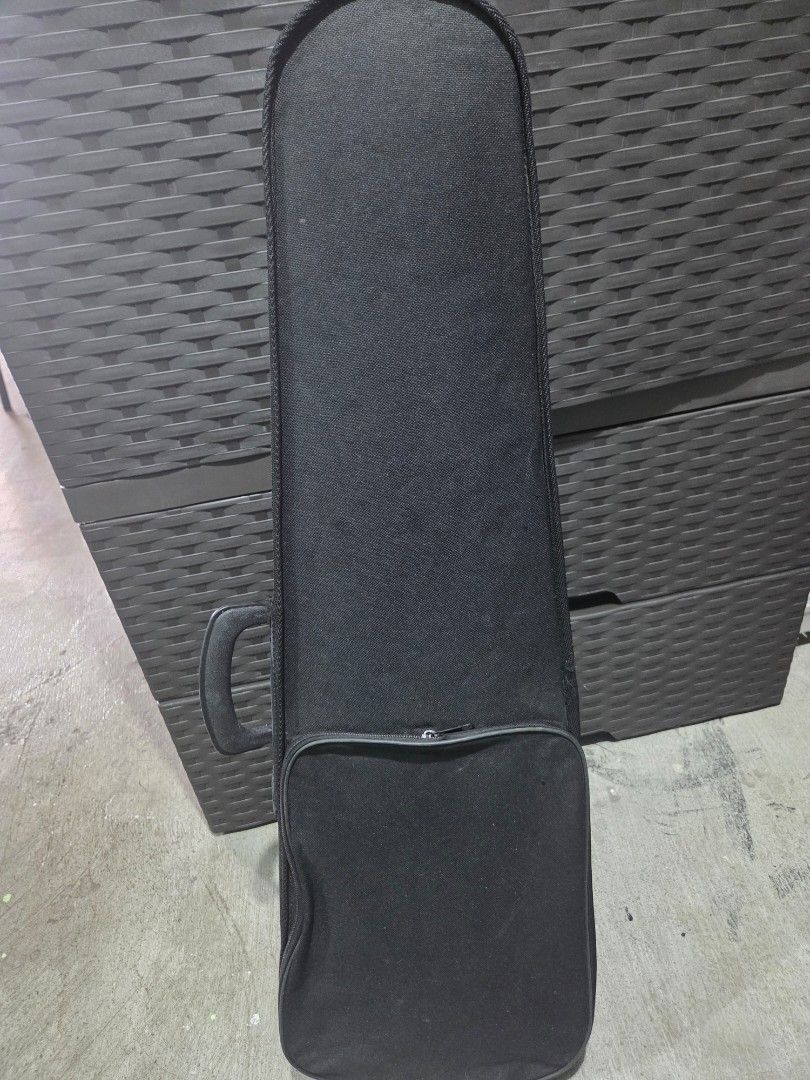 Acoustic Violin with Hard Case and Bow (Category: Musical Instruments) located in Muntinlupa City. Submitted by lou_ao (Listing ID 1469788402, Image 2). Description: - Instrument: Acoustic violin with a natural wood finish - Hardware: Standard pegs, bridge, tailpiece, and chinrest - Included: Matching bow and durable padded hard case - Interior: Soft beige fabric lining for extra protection - Condition: Stored safely in its zip case, ready for pr