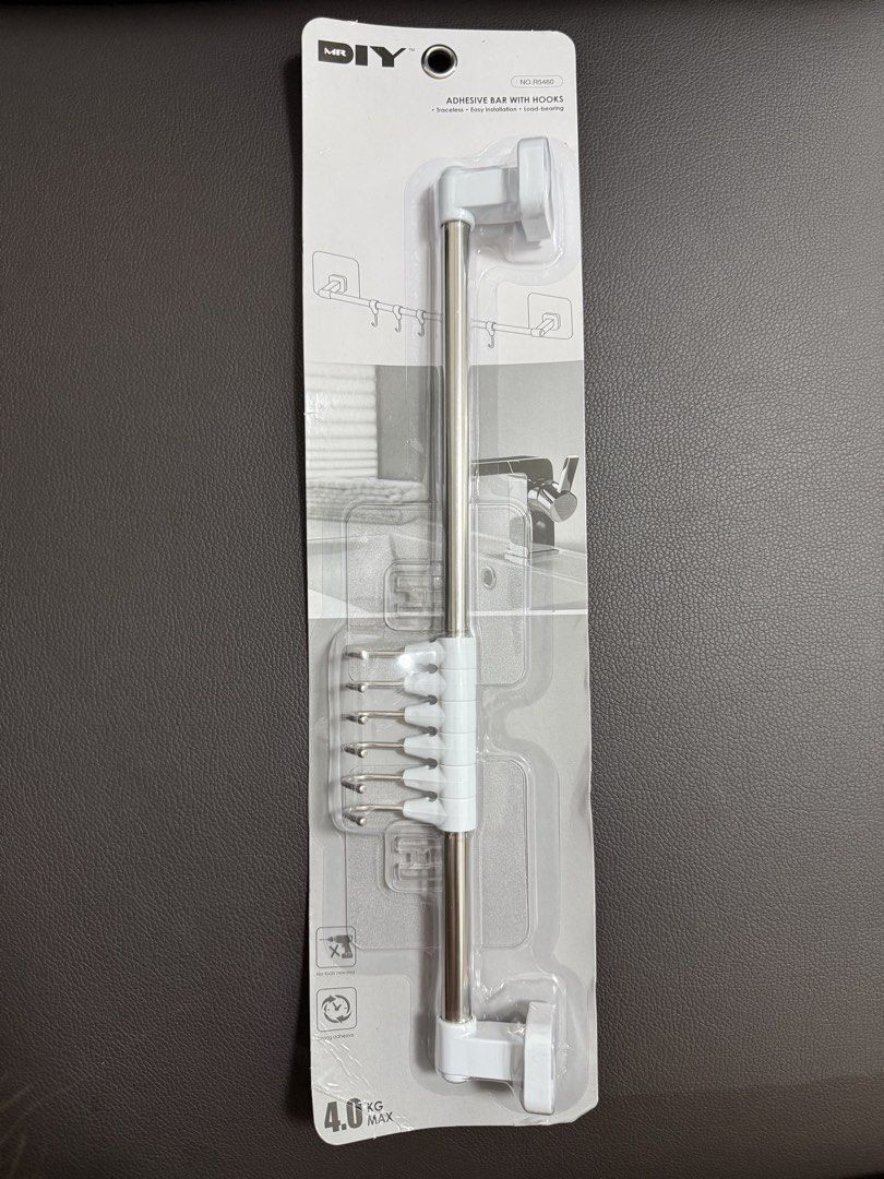 Adhesive Bar with Hooks R5460 (Category: Home Improvement Tools & Accessories) located in Quezon City. Submitted by edenkhan (Listing ID 1469915212, Image 1). Description: Adhesive Bar with Hooks *Size 423 x 50 x 75mm *Traceless *Easy Installation *Load-bearing *No tools needed *Strong Adhesive *4.0Kg Max Suitable for: Smooth and even walls, ceramic tiles, glass, metal, stainless steel, and plastic surfaces. How to Install: 1. Clean and dry the s