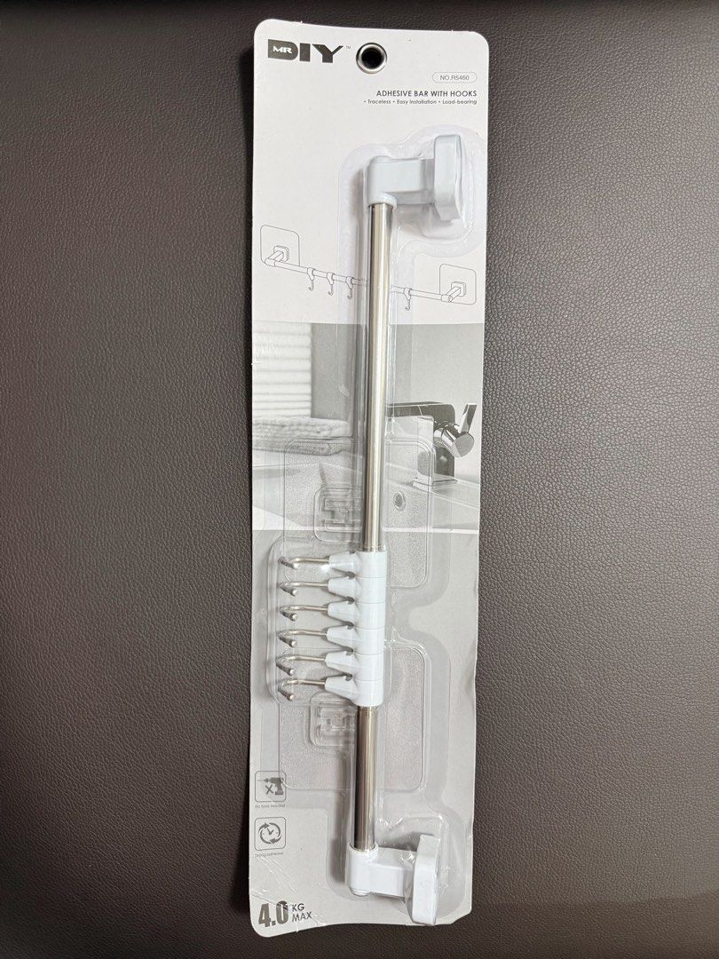 Adhesive Bar with Hooks R5460 (Category: Home Improvement Tools & Accessories) located in Quezon City. Submitted by edenkhan (Listing ID 1469915212, Image 2). Description: Adhesive Bar with Hooks *Size 423 x 50 x 75mm *Traceless *Easy Installation *Load-bearing *No tools needed *Strong Adhesive *4.0Kg Max Suitable for: Smooth and even walls, ceramic tiles, glass, metal, stainless steel, and plastic surfaces. How to Install: 1. Clean and dry the s