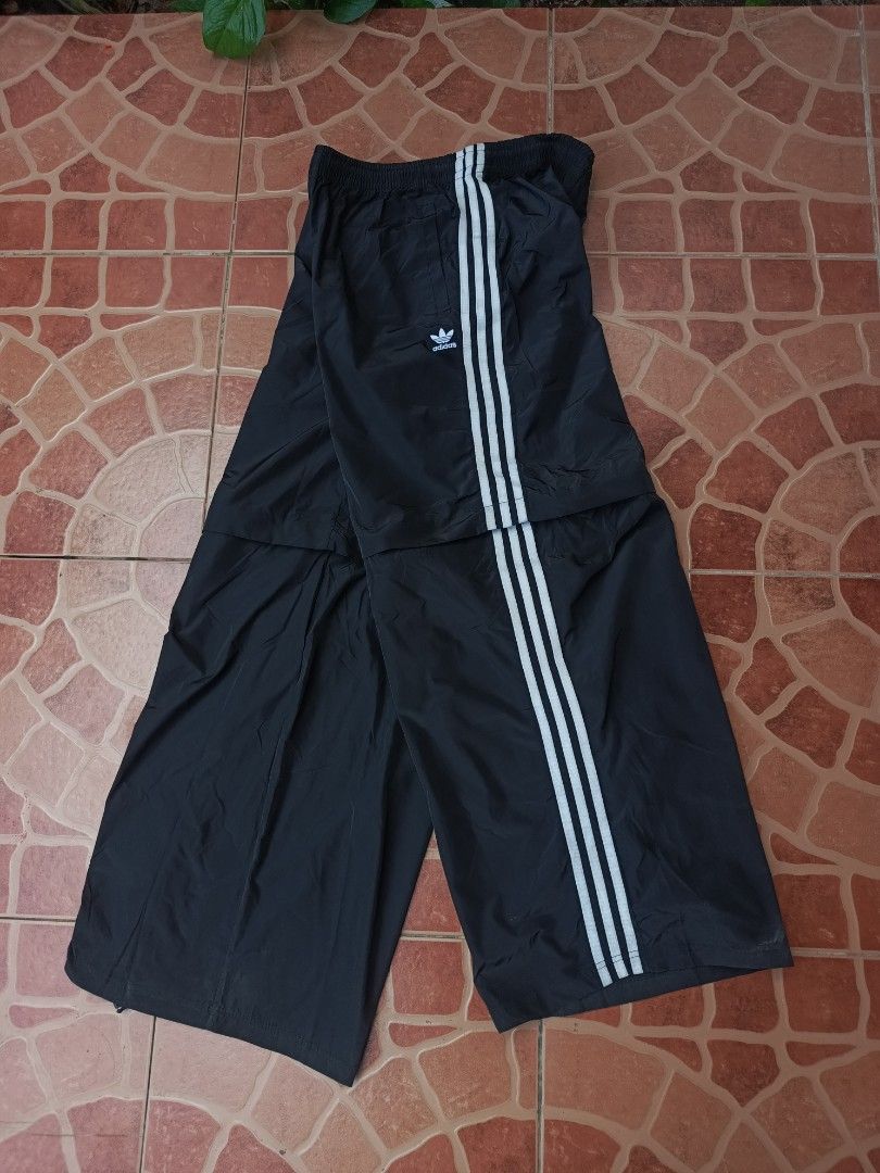 Adidas Adilenium Oversized Track Pants (Category: Joggers) located in Dipolog. Submitted by just_thriftfinds (Listing ID 1469911354, Image 3). Description: Authentic/Legit SIZE: Large/XL DIMES: Waist 30-40 Length 40 CONDITION: EXCELLENT CONDITION ISSUE: NO ISSUE.