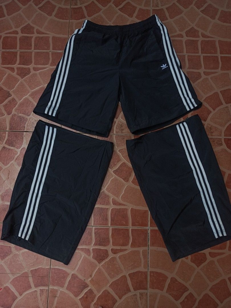 Adidas Adilenium Oversized Track Pants (Category: Joggers) located in Dipolog. Submitted by just_thriftfinds (Listing ID 1469911354, Image 2). Description: Authentic/Legit SIZE: Large/XL DIMES: Waist 30-40 Length 40 CONDITION: EXCELLENT CONDITION ISSUE: NO ISSUE.
