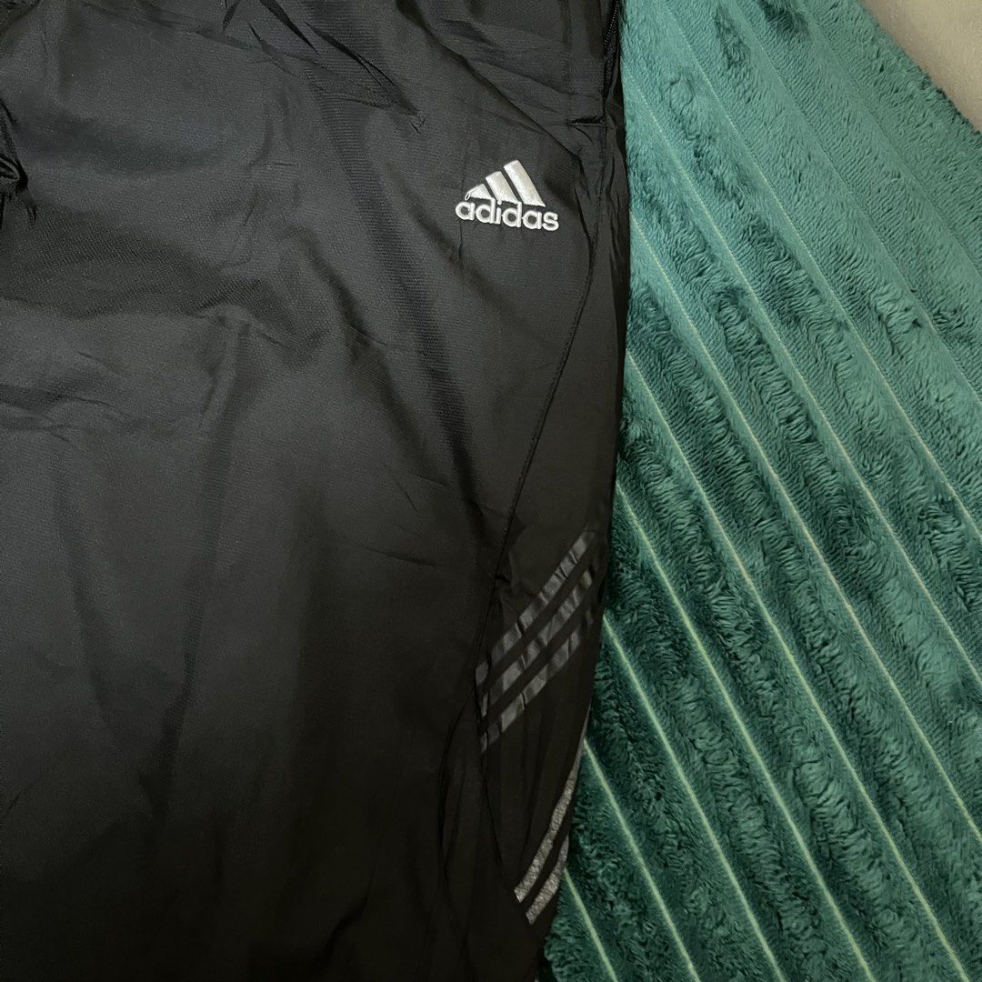 Adidas Black Track Pants (Category: Joggers) located in Manila. Submitted by thriftkolngeh (Listing ID 1469935015, Image 2). Description: - Brand: Adidas - Color: Black with silver logo and reflective three stripes - Size: Asian XXXL - Country of Origin: Made in Indonesia - Features: Elastic waistband with drawstring, cozy inner lining for extra warmth - Condition/Use: Great for workouts or casual streetwear pm sa ibang dets tinamad nko palitan e