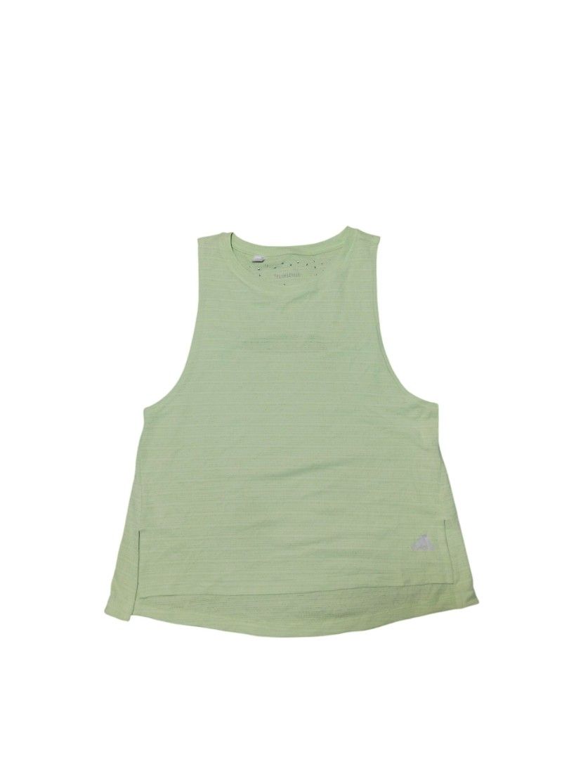 ADIDAS CLIMACHILL SLEEVELESS RUNNING TOP 💚 (Category: Activewear) located in Cagayan de Oro. Submitted by thriftots (Listing ID 1469825432, Image 1). Description: ADIDAS CLIMACHILL TANK TOP LIME GREEN💚 • Brand: Adidas • Technology: ClimaChill • Color: Lime Green • Type: Sleeveless Sports / Running Top • Features: Breathable sportswear design • Style: Lightweight athletic wear • Condition: Preloved / Thrifted 📏 Measurements: • Length: 22 inches