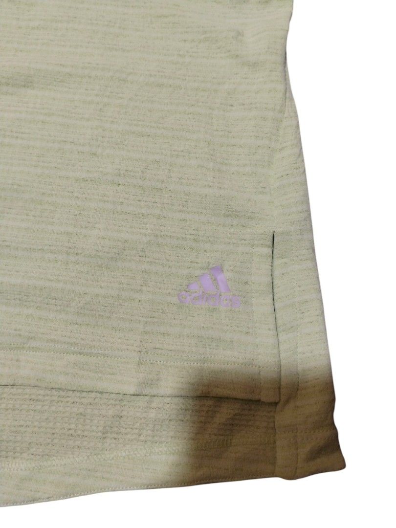 ADIDAS CLIMACHILL SLEEVELESS RUNNING TOP 💚 (Category: Activewear) located in Cagayan de Oro. Submitted by thriftots (Listing ID 1469825432, Image 3). Description: ADIDAS CLIMACHILL TANK TOP LIME GREEN💚 • Brand: Adidas • Technology: ClimaChill • Color: Lime Green • Type: Sleeveless Sports / Running Top • Features: Breathable sportswear design • Style: Lightweight athletic wear • Condition: Preloved / Thrifted 📏 Measurements: • Length: 22 inches