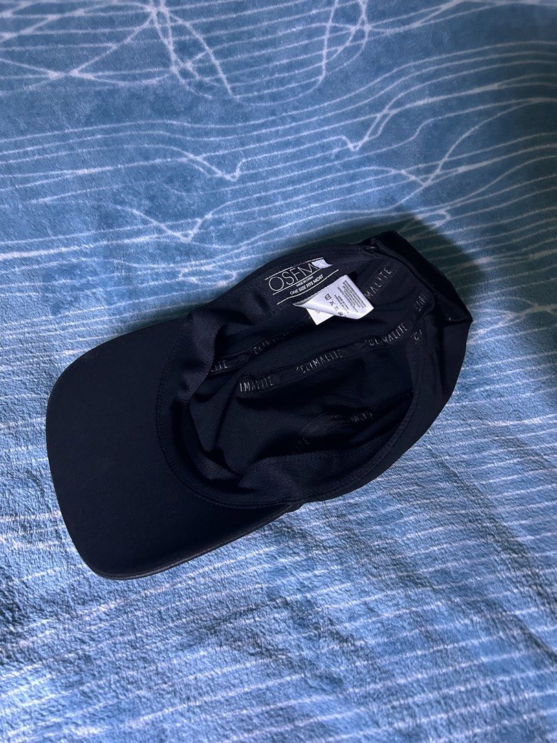 Adidas Climalite Black Cap OSFM (Category: Caps & Hats) located in Quezon City. Submitted by thriftxgoods (Listing ID 1469895603, Image 2). Description: - Brand: Adidas Climalite - Color: Classic black with grey front logo - Size: One size fits most with adjustable strap - Material: 90% recycled polyester, 10% elastane - Features: Interior sweatband with repeated Adidas branding, moisture-wicking technology - Condition: Clean, great for running, 