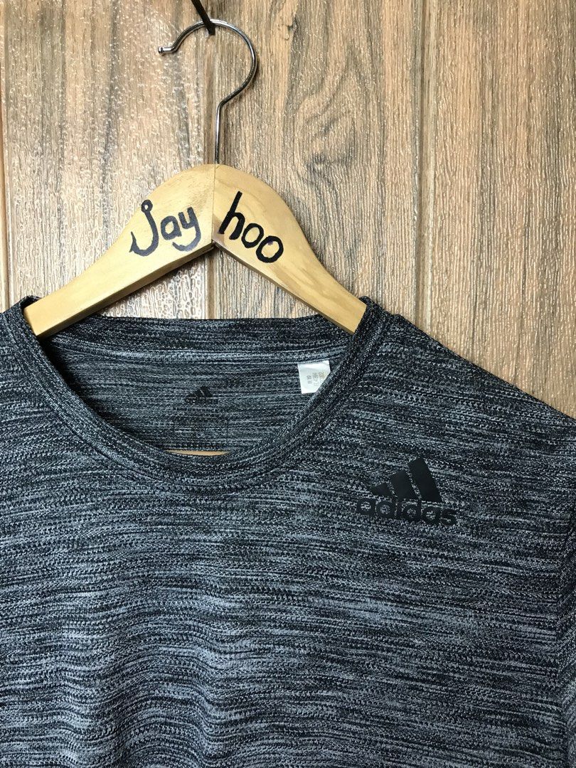 Adidas Gradient T-shirt Grey Black 2XL (Category: Tshirts & Polo Shirts ) located in Aloguinsan. Submitted by jayhooukay (Listing ID 1469862532, Image 2). Description: -22 x 26 As new - Brand: Adidas - Size: 2XL (Chest width: 110cm) - Color: Grey and black gradient heathered - Material: 100% recycled polyester (lightweight activewear fabric) - Design: Short sleeves, crew neck, black Adidas logo on left chest - Condition/Use: Perfect for workouts 