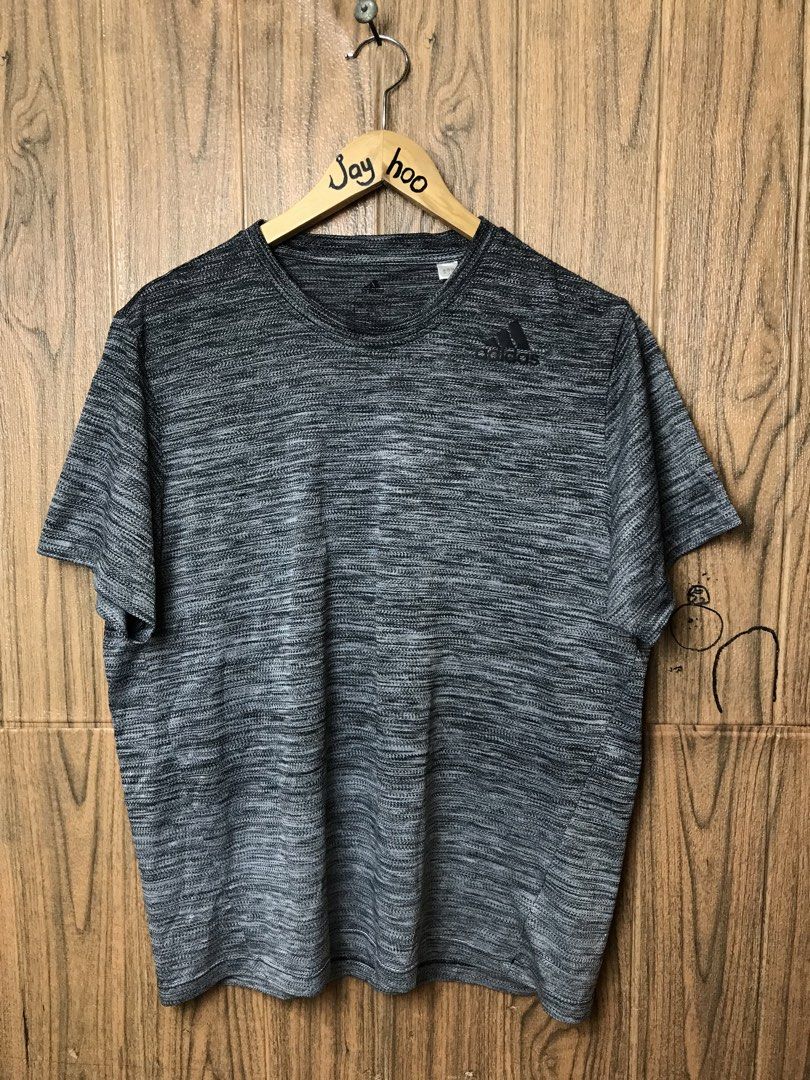 Adidas Gradient T-shirt Grey Black 2XL (Category: Tshirts & Polo Shirts ) located in Aloguinsan. Submitted by jayhooukay (Listing ID 1469862532, Image 1). Description: -22 x 26 As new - Brand: Adidas - Size: 2XL (Chest width: 110cm) - Color: Grey and black gradient heathered - Material: 100% recycled polyester (lightweight activewear fabric) - Design: Short sleeves, crew neck, black Adidas logo on left chest - Condition/Use: Perfect for workouts 