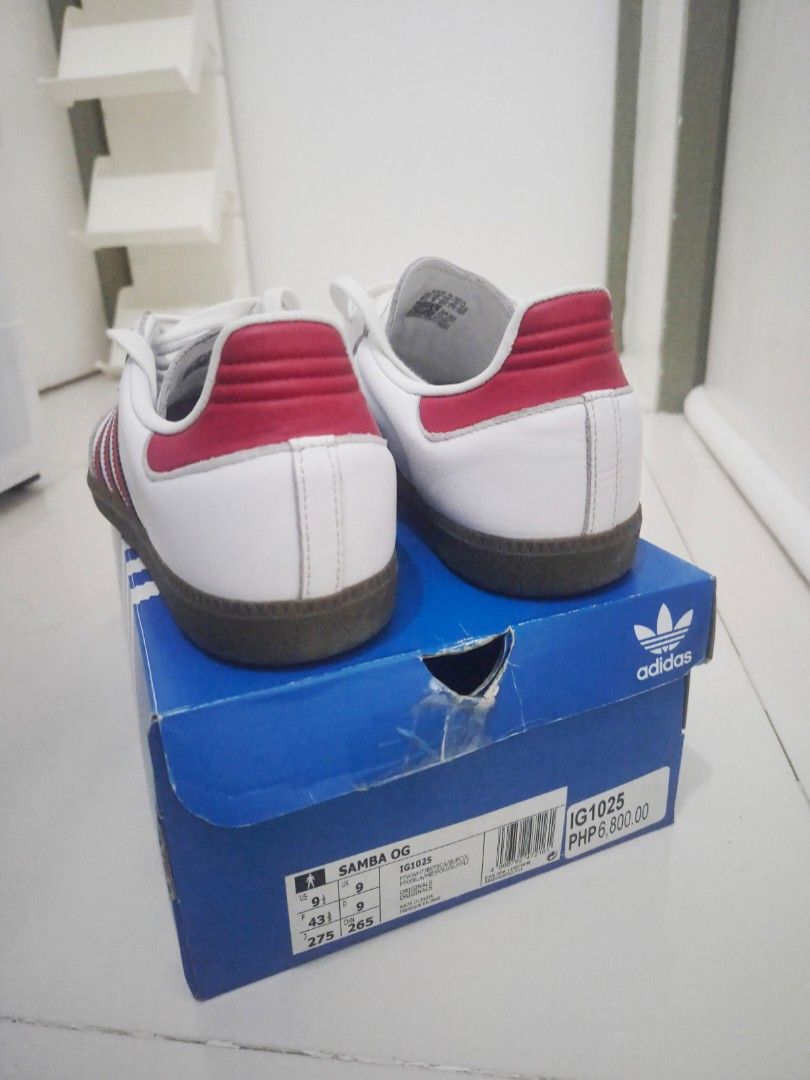 Adidas Samba OG White Red IG1025 (Category: Sneakers) located in Manila. Submitted by bhoypablo (Listing ID 1469759548, Image 3). Description: - Model: Adidas Samba OG - Colorway: White with bold red stripes - Size: US 9.5 / UK 9 - Condition: Like new with original blue shoebox and matching label/barcode - Details: Classic gum soles, suede toe overlays, and blue tongue branding - Authenticity guaranteed, ships fast!.