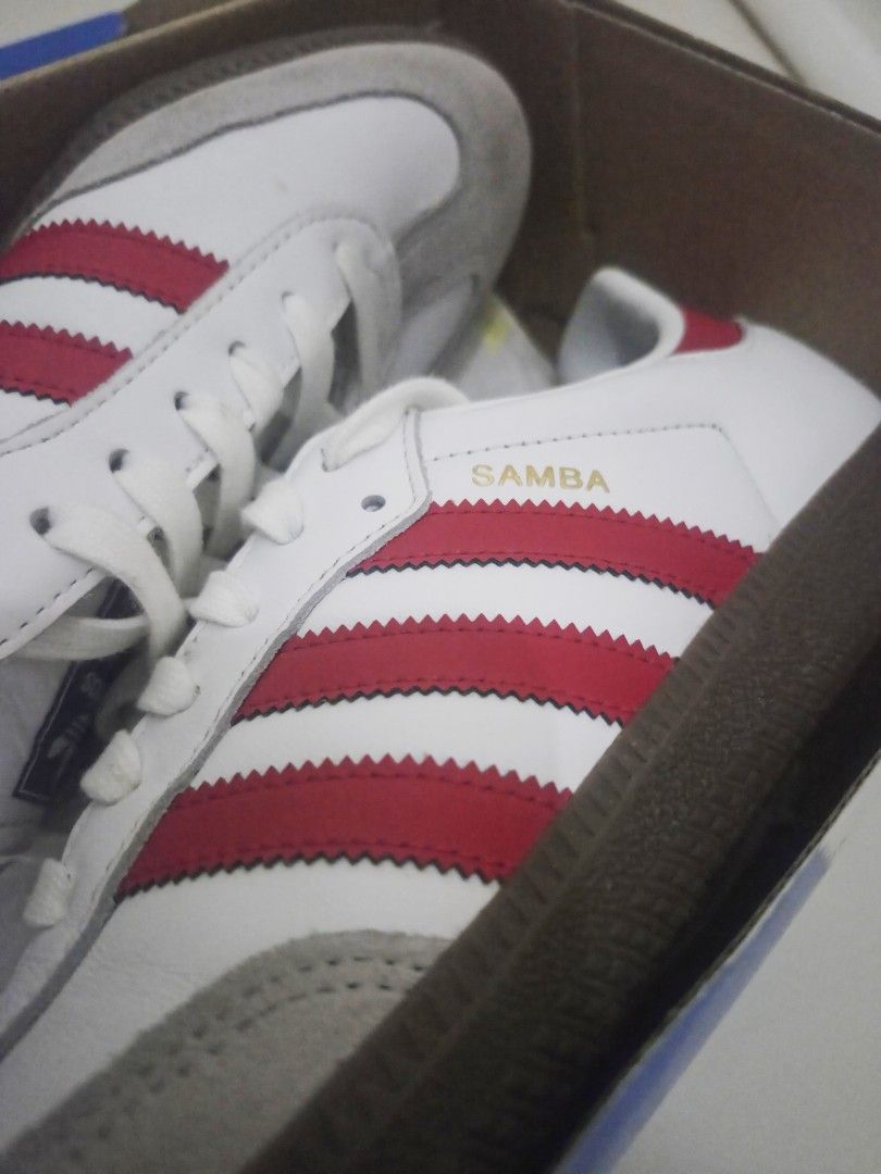 Adidas Samba OG White Red IG1025 (Category: Sneakers) located in Manila. Submitted by bhoypablo (Listing ID 1469759548, Image 2). Description: - Model: Adidas Samba OG - Colorway: White with bold red stripes - Size: US 9.5 / UK 9 - Condition: Like new with original blue shoebox and matching label/barcode - Details: Classic gum soles, suede toe overlays, and blue tongue branding - Authenticity guaranteed, ships fast!.