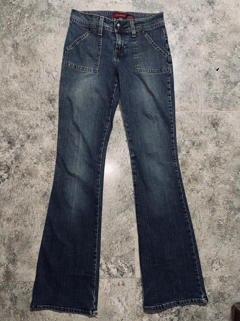 Aeropostale Flare Jeans Size 0L (Category: Jeans) located in Dagupan City. Submitted by shanadongsb (Listing ID 1469864373, Image 1). Description: - Brand/Style: Aeropostale low-rise flare jeans - Wash/Color: Medium wash denim with contrast stitching - Size: 0L (Long) - Details: Front flap pockets and button-flap back pockets - Material: Cotton, polyester, and spandex blend - Condition: Slight distressing along the bottom hems from regular wear.
