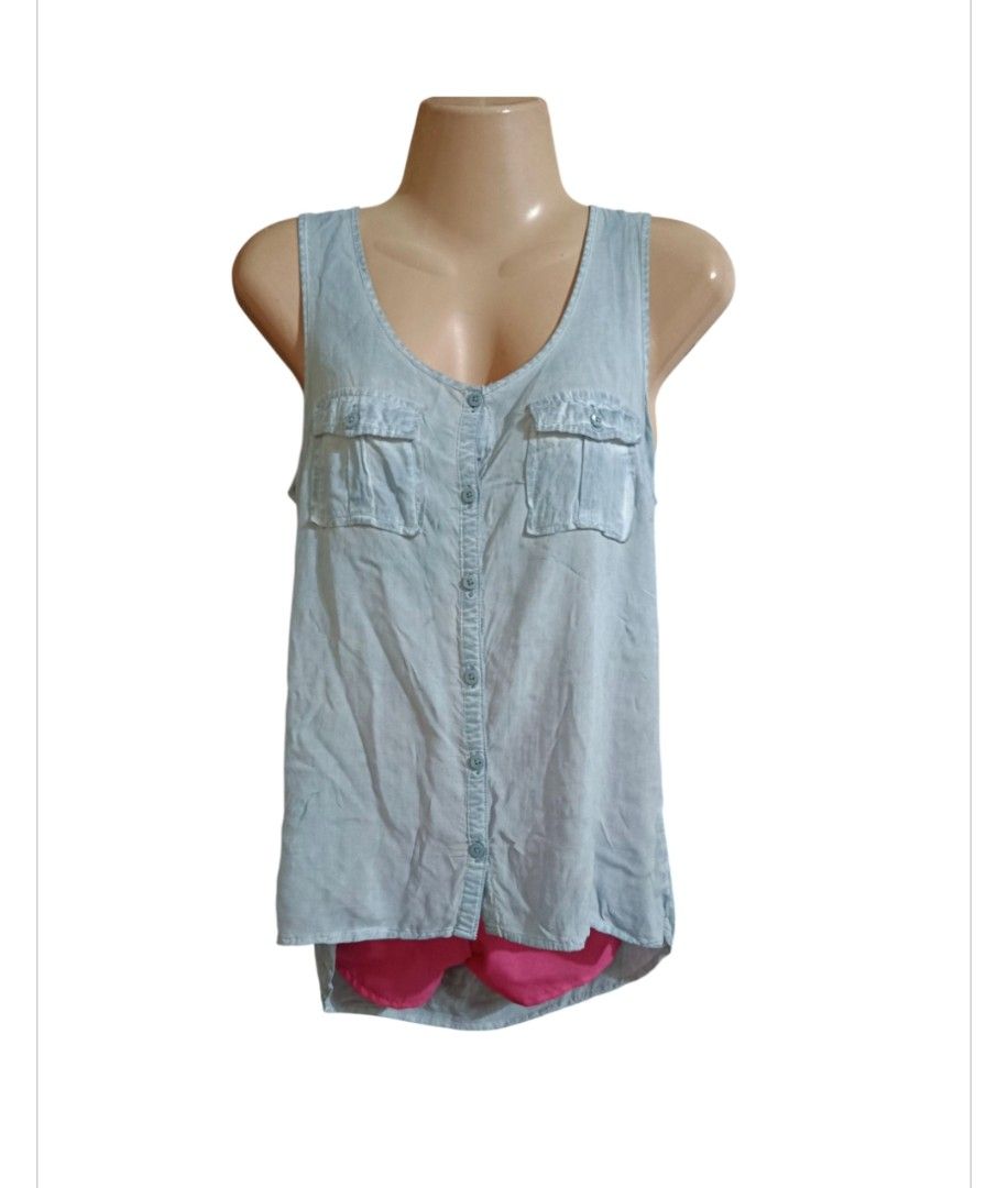 Aeropostale Light Blue Button-Front Tank Top (Category: Sleeveless) located in Paranaque City. Submitted by calm_youngstore7 (Listing ID 1469772201, Image 1). Description: - Brand: Aeropostale (Brand new with tags attached) - Color: Light blue - Style: Sleeveless top with front button placket and dual chest pockets - Hem: High-low curved hem design - Fabric: Lightweight and soft material - Measurements: ~18" pit-to-pit, ~28" back length.