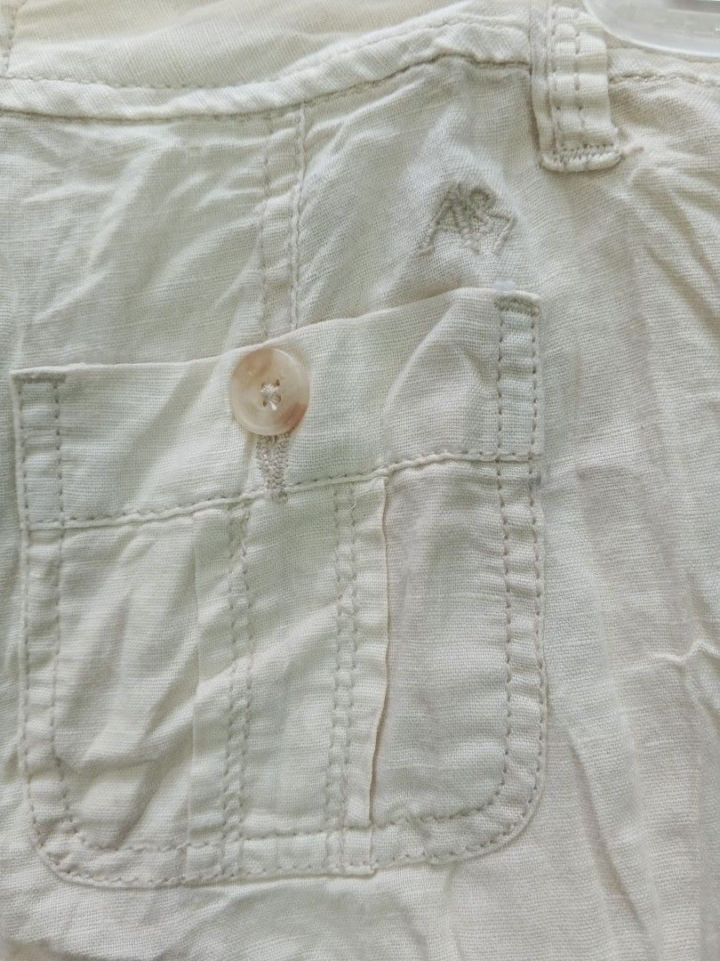 Aeropostale Y2K VINTAGE short (Category: Shorts) located in Manila. Submitted by icamalicdem29 (Listing ID 1469851289, Image 3). Description: vintage Y2K-style low-rise utility micro shorts from Aéropostale. These ivory/cream cotton shorts feature a classic 2000s low-waist silhouette, slant front utility pockets with detailed heavy stitching, belt loops, and a single-button front zip fly closure..