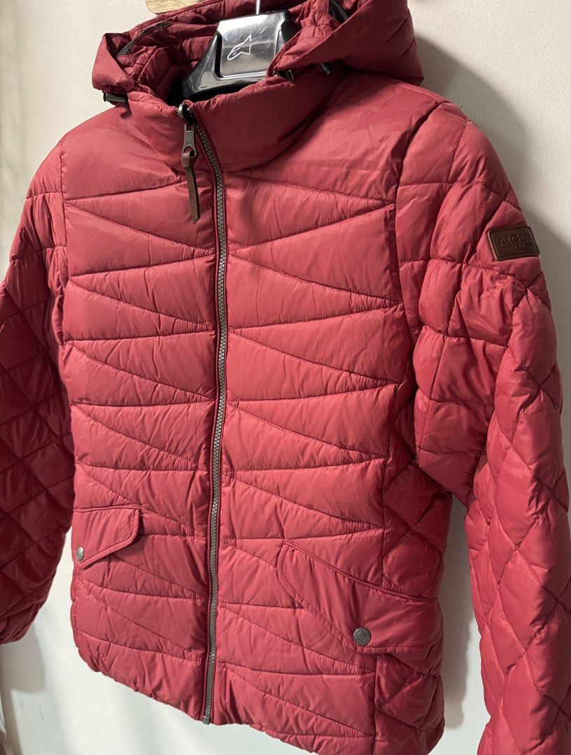 Aigle Quilted Puffer Jacket with Hood (Category: Coats, Jackets and Outerwear) located in La Trinidad. Submitted by toronnie22 (Listing ID 1469851341, Image 1). Description: Aigle puffer jacket Women’s Color:light red Color rate 10/10 Dimension in inches 20W L25 women’s small to medium In very good condition NO ISSUE NO ISSUE 1700plus sf Ship via j&t only Baguio location Respect Red quilted puffer jacket from Aigle, established 1853. Full zip fro