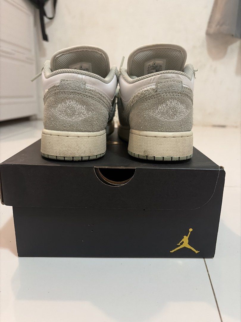 Air Jordan 1 Low SE Seafoam (Category: Sneakers) located in Paranaque City. Submitted by jobzrb (Listing ID 1469878707, Image 1). Description: - Model: Air Jordan 1 Low SE (Seafoam) - Sizing: Grade School (GS) - Condition: Clean midsoles, solid tread, great everyday pair - Design: White leather base with light green fuzzy suede overlays - Inclusion: Comes with original black box.