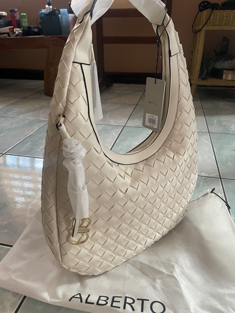 Alberto Woven Hobo Bag White (Category: Shoulder Bags) located in Quezon City. Submitted by lovebytheyyy (Listing ID 1469843238, Image 2). Description: FOR SALE: Alberto Woven Hobo Bag – White 🤍 ✨ Brand New & Never Used! 📍 Bought from Alberto Physical Store 💰 Original Price: ₱2,799 🔥 Selling Price: ₱2,300 ONLY! 📌 RFS: Need funds Get this classy and versatile white hobo bag at a lower price! Perfect for everyday use and effortlessly chic outf