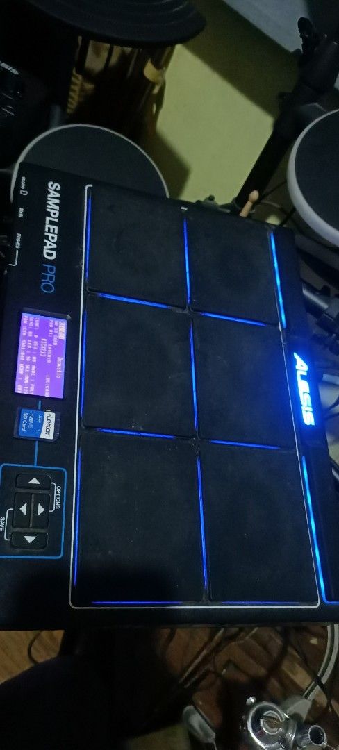 Alesis SamplePad Pro Electronic Percussion Instrument (Category: Musical Instruments) located in Taguig. Submitted by grandfish_55ab5c (Listing ID 1469911809, Image 1). Description: - Alesis SamplePad Pro electronic percussion pad in excellent working condition - 6 responsive black pads featuring bright blue LED lighting for easy visibility on stage - Active LCD screen displaying acoustic kit settings with fully operational navigation controls - 