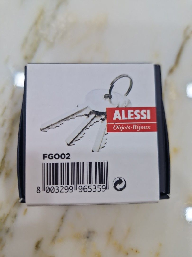 Alessi Objets-Bijoux Key Ring FG002 (Category: Luxury Accessories) located in Quezon City. Submitted by thercor (Listing ID 1469946487, Image 2). Description: - Brand: Alessi Key - Model: FG002 (Objets-Bijoux line) - Condition: Brand new in original box - Design: Mouse figure.