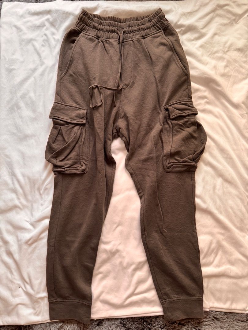 AllSaints Brown Cargo Sweatpants Size S (Category: Joggers) located in Cebu City. Submitted by txproj27 (Listing ID 1469792853, Image 2). Description: - Brand: AllSaints - Color: Brown - Size: Small (180/78A) Can fit up to Medium - Material: 100% Cotton with super comfortable fleece lining (Made in Turkey) - Waistband: Thick elastic with adjustable drawstring closure - Cuffs: Ribbed ankle cuffs - Pockets: Large utility cargo pockets on both legs 