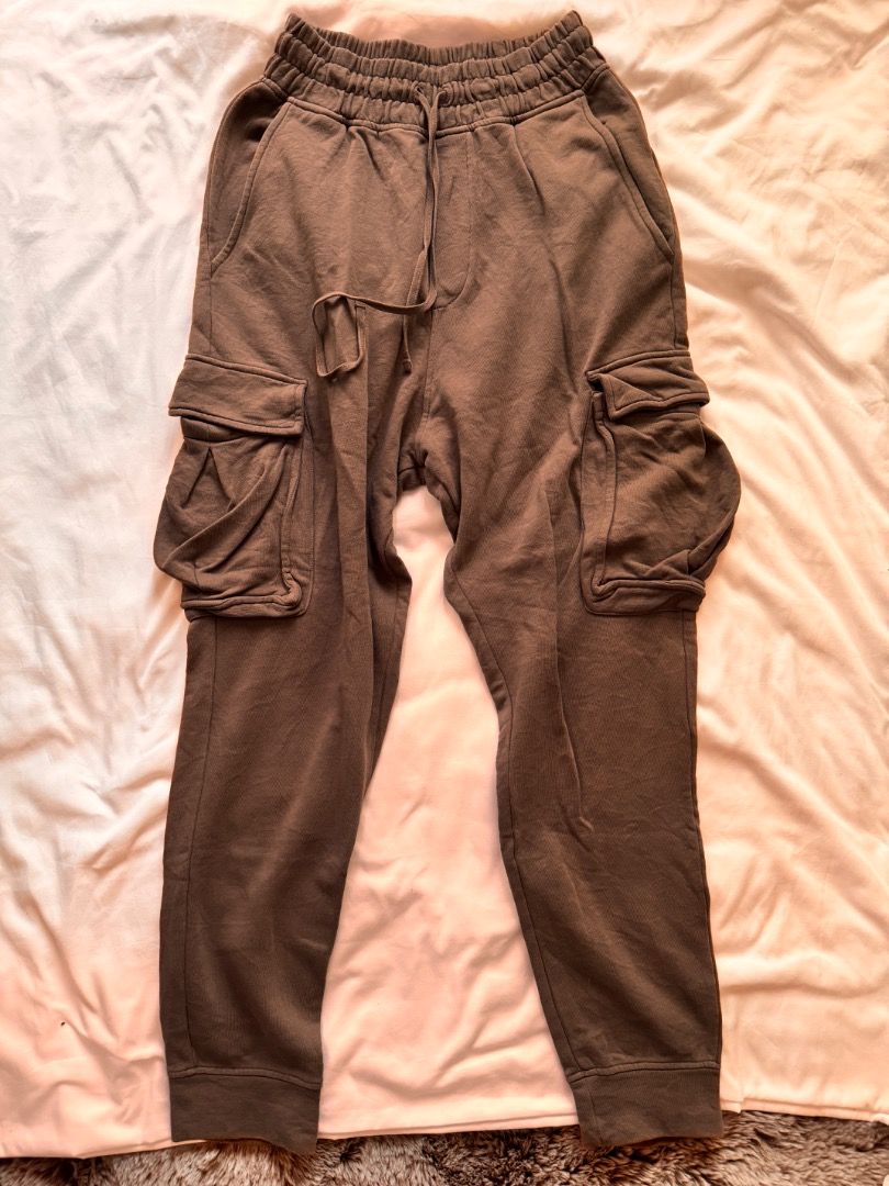 AllSaints Brown Cargo Sweatpants Size S (Category: Joggers) located in Cebu City. Submitted by txproj27 (Listing ID 1469792853, Image 1). Description: - Brand: AllSaints - Color: Brown - Size: Small (180/78A) Can fit up to Medium - Material: 100% Cotton with super comfortable fleece lining (Made in Turkey) - Waistband: Thick elastic with adjustable drawstring closure - Cuffs: Ribbed ankle cuffs - Pockets: Large utility cargo pockets on both legs 