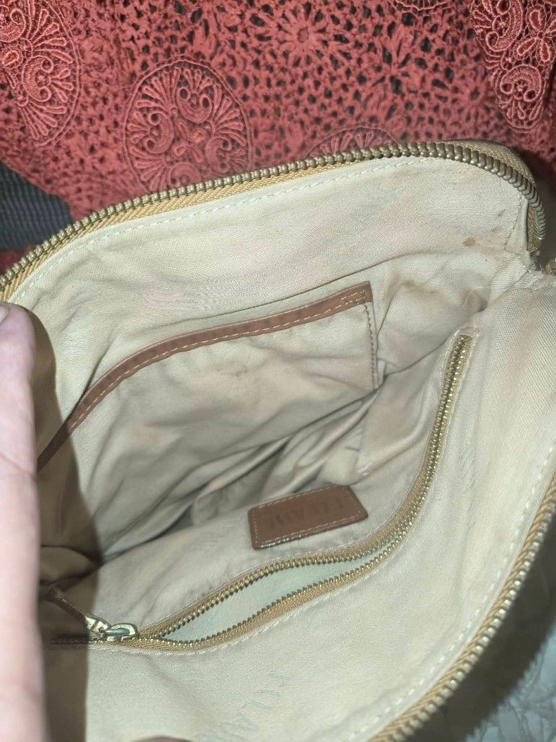 Alviero Martini bag (Category: Luxury Bags & Wallets) located in Tabuk. Submitted by iamkyshua90650 (Listing ID 1469778723, Image 3). Description: Likenee cond. has some dot stains lang on the inside..