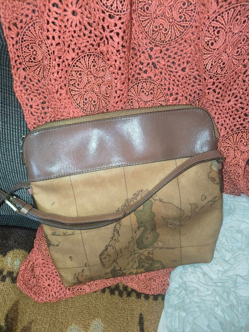 Alviero Martini bag (Category: Luxury Bags & Wallets) located in Tabuk. Submitted by iamkyshua90650 (Listing ID 1469778723, Image 2). Description: Likenee cond. has some dot stains lang on the inside..