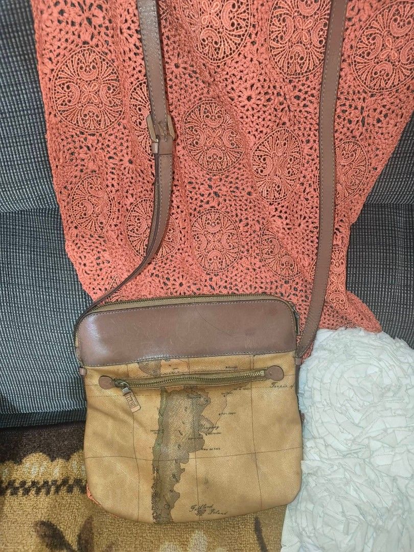 Alviero Martini bag (Category: Luxury Bags & Wallets) located in Tabuk. Submitted by iamkyshua90650 (Listing ID 1469778723, Image 1). Description: Likenee cond. has some dot stains lang on the inside..
